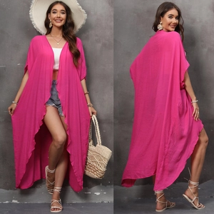 Fuchsia long kimono cardigan with loose sleeves and irregular hem for beach vacation