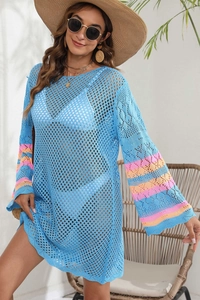 Detail of colorful striped flare sleeves on blue crochet beach cover-up dress