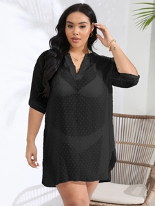 Black Swiss dot V-neck beach cover-up with sheer chiffon texture and side slits