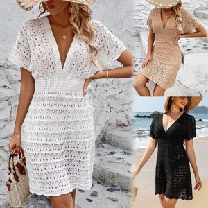 Detailed knit patterns of the V-neck beach cover-up in white, apricot, and black colors