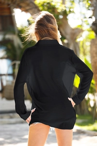 Rear view of lightweight black button-down beach cover-up with classic collar style