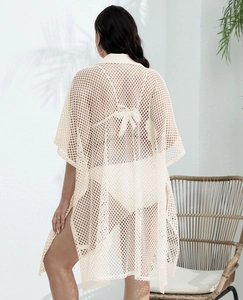 Back view of cream mesh crochet beach cover-up with open stitch design and collar
