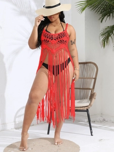 Red crochet beach cover-up dress with tassel details and bohemian hollow knit design