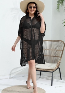 Detail of black hollow mesh beach cover-up with collar and button-down design