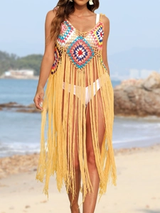 Colorful handmade crochet beach cover-up dress with long fringes and bohemian style