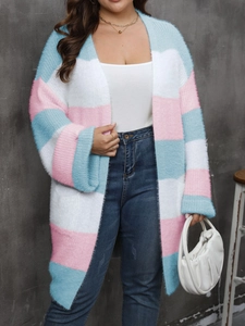 Detail of soft striped plush cardigan in light blue and pink with fuzzy texture