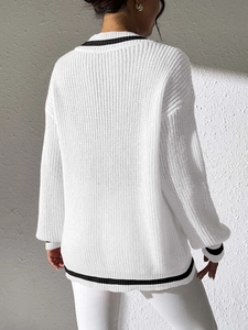 Preppy style white knit V-neck sweater with black contrast stripes and loose fit
