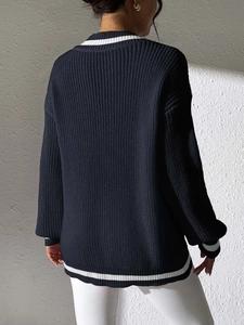 Women's V-neck navy blue knit sweater with white stripes in preppy style, back view