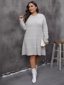 Plus size grey long sleeve knit dress with white grid pattern and round neck