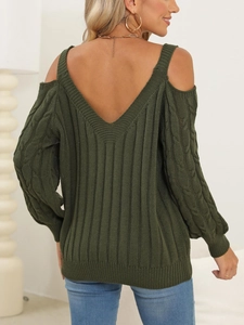 Detail view of dark green off-shoulder knit sweater with V-back and cable knit patterns