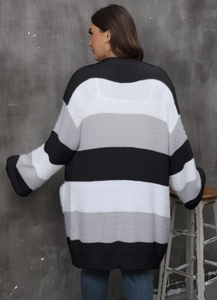 Detail of oversized striped cardigan featuring soft mohair texture and grey color blocks