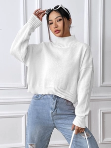 Women's white high-neck cropped knit sweater in a loose casual style with ribbed cuffs