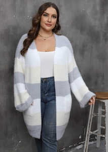 Close-up of soft grey and yellow striped knit cardigan with large side pockets