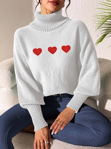 White high-neck knitted sweater with red heart embroidery and drop shoulder long sleeves