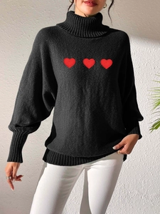 Close-up of black high-neck knit sweater with three red embroidered hearts for women