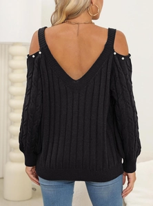 Rear view of black knitted sweater with deep V-back, open shoulders and pearl details
