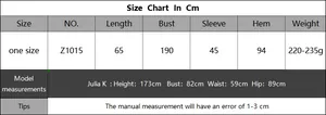 Detailed size chart for the oversized knit bikini cover-up top with batwing sleeves