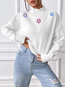 White high collar knit sweater with colorful flower embroidery and drop shoulder style