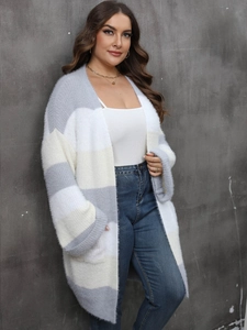 Close-up of a long-sleeved striped knit cardigan with fuzzy texture and open front style