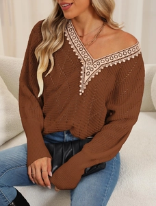 Detail of coffee brown hollow-out knit sweater with delicate lace V-neckline splicing