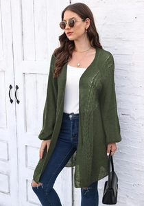 Detail shot of olive green openwork knit cardigan with textured cable pattern