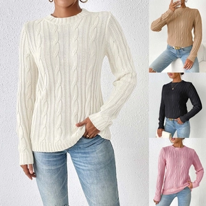 Detailed close-up showing the elegant twist-knit pattern on this slim women's sweater