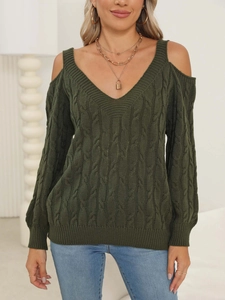 Detail of dark green cable knit sweater with deep V-neck and cold-shoulder design