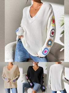 Women's V-neck knit sweater featuring colorful crochet flower patch sleeves in various colors