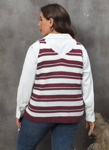 Detail view of the back fit of a striped V-neck knitted vest paired with a white shirt