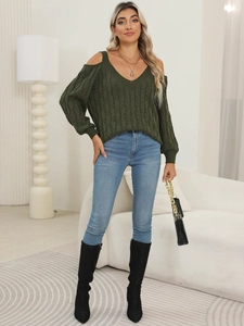 Dark green V-neck cold-shoulder sweater featuring classic cable knit texture and loose fit