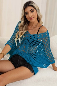 Detail of teal crochet hollow knit cover up with batwing sleeves and V-neckline texture