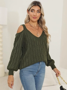 Detailed view of dark green cold-shoulder chunky knit sweater with deep V-neck design