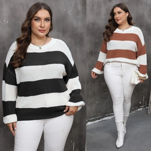 Close-up of color block striped oversized knit sweater with round neck and drop shoulders