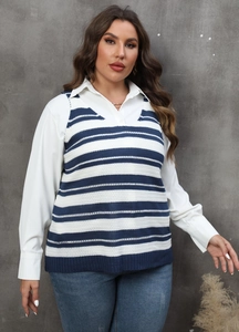 Close-up of women's blue and white striped knit vest layered over a crisp white shirt