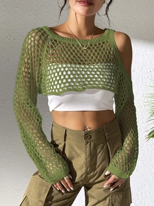Close-up of green crochet long sleeve crop top with woven mesh texture and hollow design