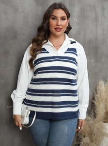 Women's V-neck striped knit vest layered over a white long-sleeve shirt with jeans