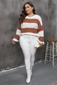 Detail of plus size women's sweater featuring brown and white horizontal stripes and knit texture