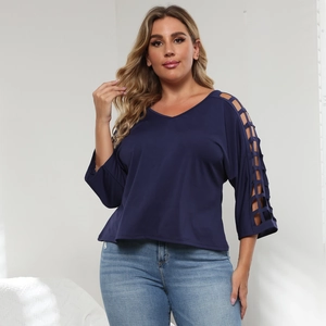Detail view of navy blue V-neck top with hollow cut-out lattice sleeves and casual fit