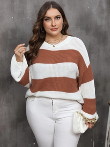 Detail of plus size striped sweater featuring brown and white horizontal knit textures