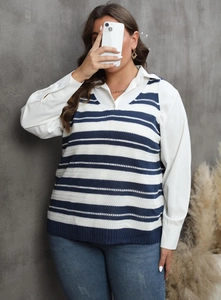 Detail of V-neck striped knit vest layered over white long sleeve shirt for women