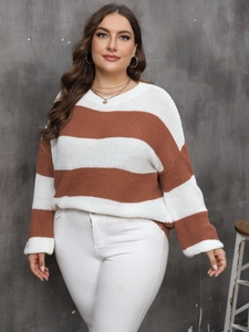 Close-up of brown and white striped knit texture on a plus size women's casual sweater