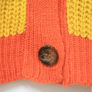 Women's color block striped cardigan with chunky knit texture and brown buttons