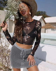 Floral sheer mesh long sleeve crop top with drawstring knit skirt by the poolside