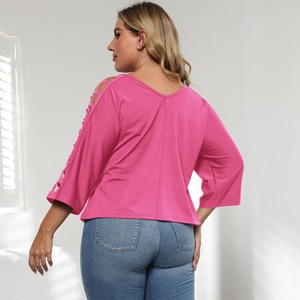 Women's plus size rose pink V-neck top with hollow knit cutout sleeves and batwing style