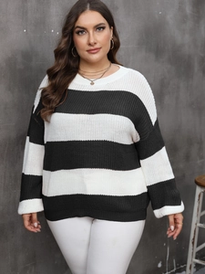 Women's plus size knit sweater featuring classic black and white horizontal stripes
