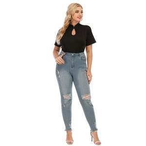 Detail of plus size black top with mandarin collar and chic teardrop cutout design