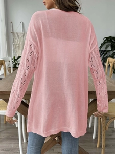 Pink long sleeve hollow knit cardigan for women in a loose fit casual style