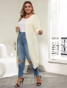 Detail view of cream knitted cardigan featuring thick weave texture and casual longline drape