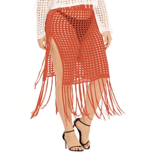 Orange crochet beach skirt with hollow mesh design and long tassels for women