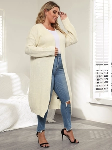 Women's cream oversized knit cardigan with drop shoulders and an open front long design